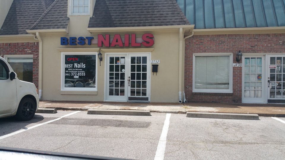 Polished nails beside glitter polish